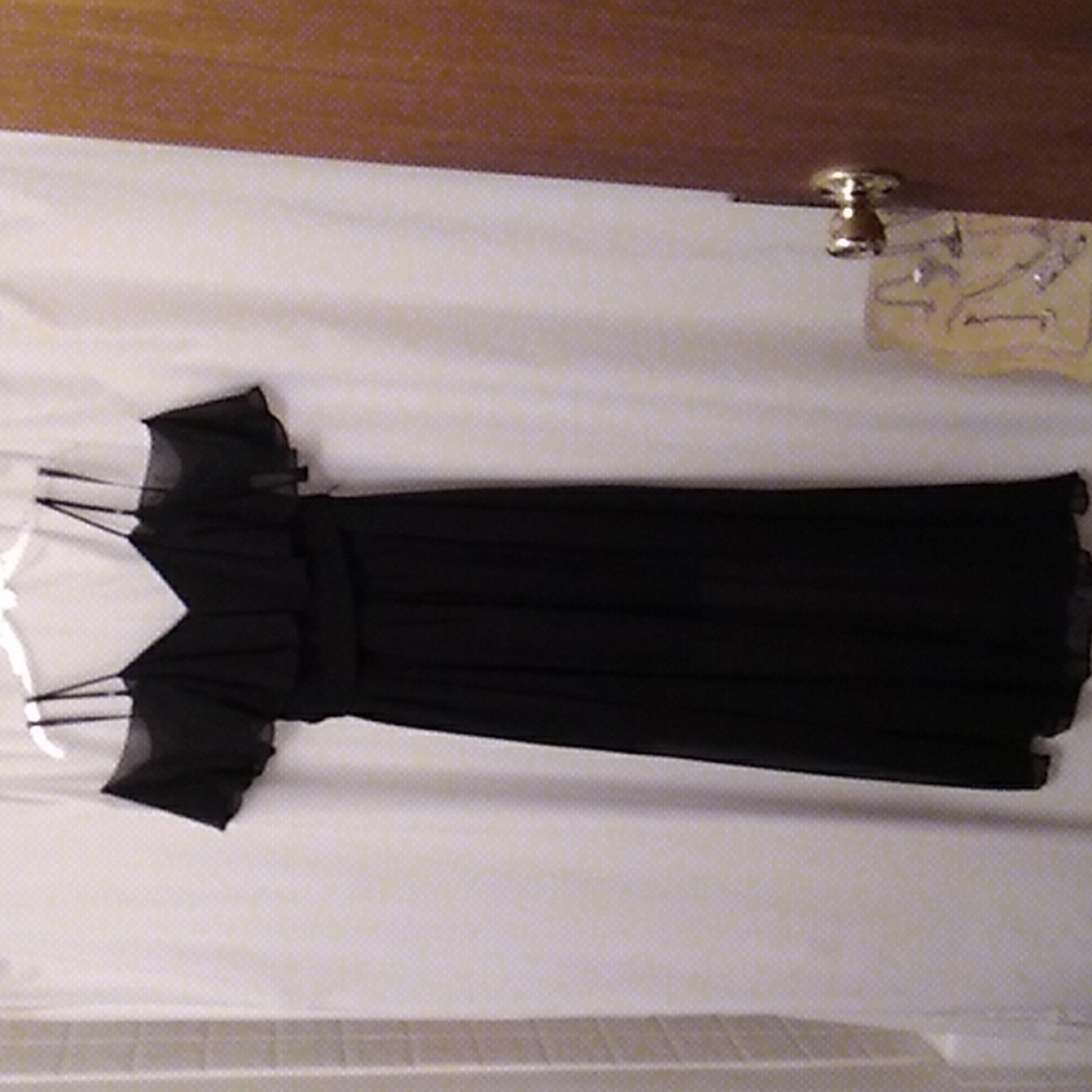 Black floor length dress sheer to floor inside length just above the knee